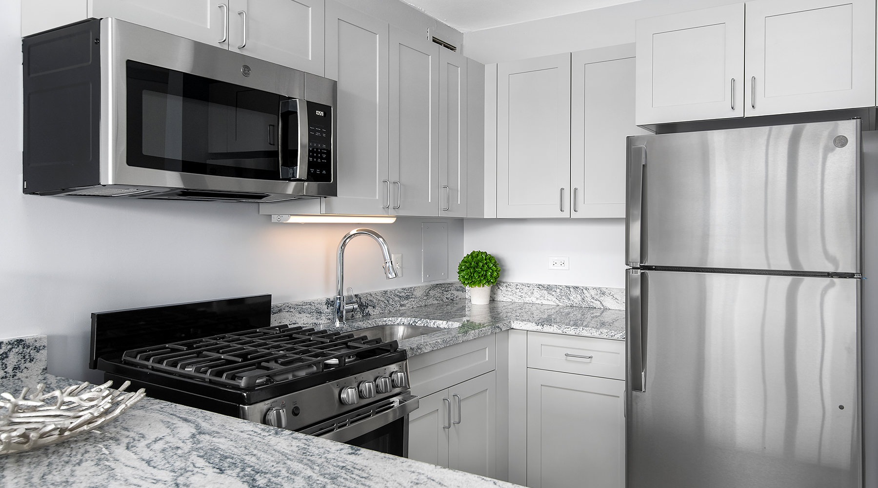 bright kitchen with stainless steel appliance and granite counter bright kitchen with stainless steel appliance and granite counter