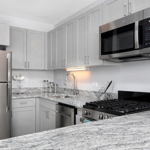 Stainless Steel Appliances in bright kitchen Stainless Steel Appliances in bright kitchen