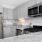 Stainless Steel Appliances in bright kitchen